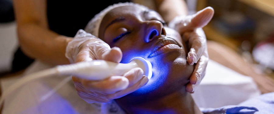 spa trends - woman getting facial treatment at a spa