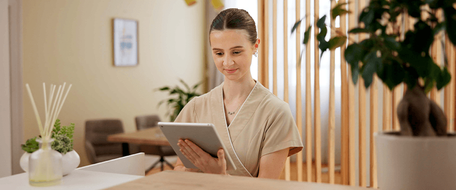 Female using spa booking software