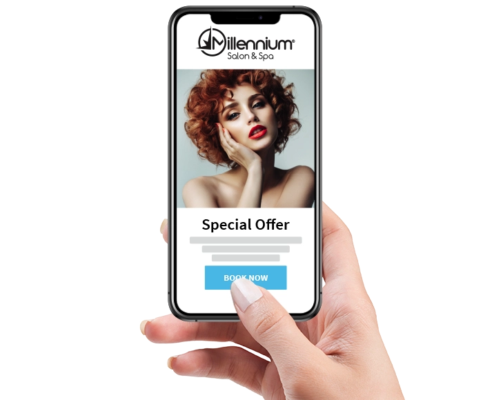 hand holding a marketing email on phone