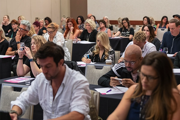 Millennium clients learning at conference