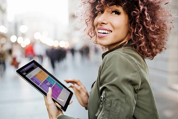 Meevo for Multi-Location: Man with an ipad using Meevo